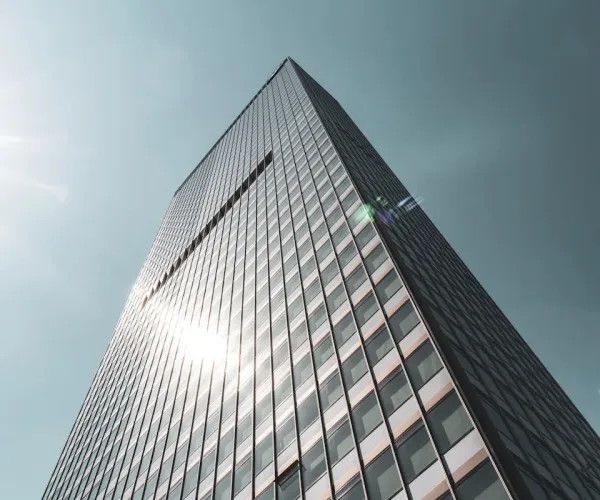 black and white building under gray sky