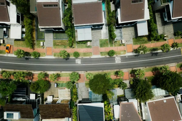 Photo by CHUTTERSNAP aerial photo of brown roof houses