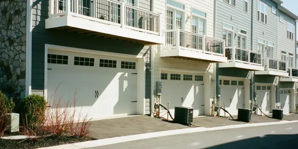 white concrete building beside road during daytime